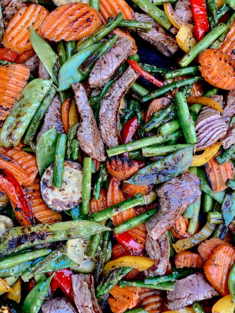 mix of steak, beans, and carrots
